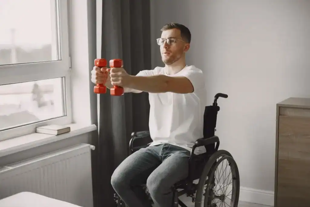 Empowering Weight Loss: A Comprehensive Guide for Individuals with Disabilities 1 Image of man doing exercise in his wheelchair to aid weight loss West Thurrock