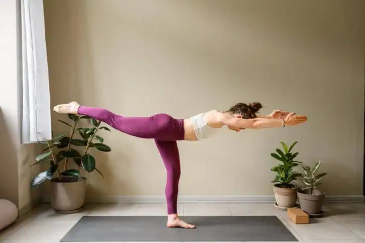 Achieving the Perfect Tone: How Often Should You Exercise for Results? 1 Woman doing Yoga exercise West Thurrock to help with toning the body.